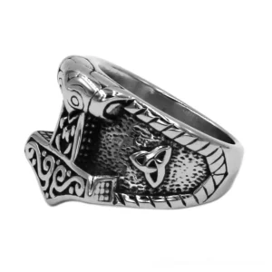 Celtic Triquetra ring left rear side view showing embossed textured surface and antiqued silver-toned finish