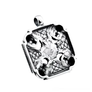 Back embossed relief detail of gothic Viking Celtic skull pendant showing ornate metalwork and ancient design