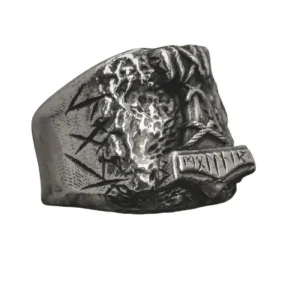 Norse rune signet ring side oblique view showing intricate carved Viking amulet details in aged silver tone