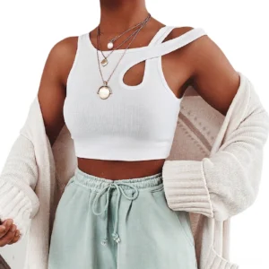 White sleeveless asymmetrical strap cut-out crop tank top worn on female model casual styling