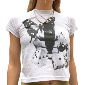 White butterfly crop top gothic alternative style front view on model with layered silver chains and dark aesthetic