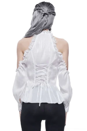 Back view of white gothic lace blouse featuring authentic corset-style lace-up ribbon detail, worn by model with braided grey hair against white studio background