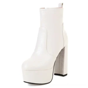 White crocodile print platform heel ankle boots with side zipper, gothic fashion aesthetic, three-quarter front view
