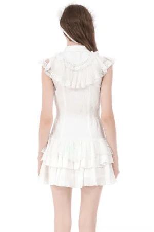 White Gothic Lolita dress back view showing structured corset bodice, ruffled back yoke, and layered tiered skirt construction