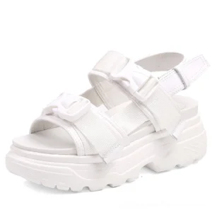 White alternative fashion platform sandals with nylon straps and adjustable buckles, front close-up