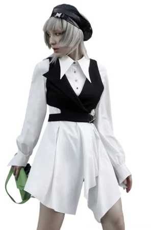 White gothic swallowtail shirt dress with asymmetrical hem worn by model with beret, front three-quarter view showcasing fitted silhouette and dramatic hemline