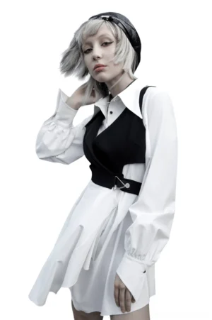 White gothic asymmetrical dress with ruffled swallowtail hem, side three-quarter view displaying curve-hugging fitted fit and architectural design