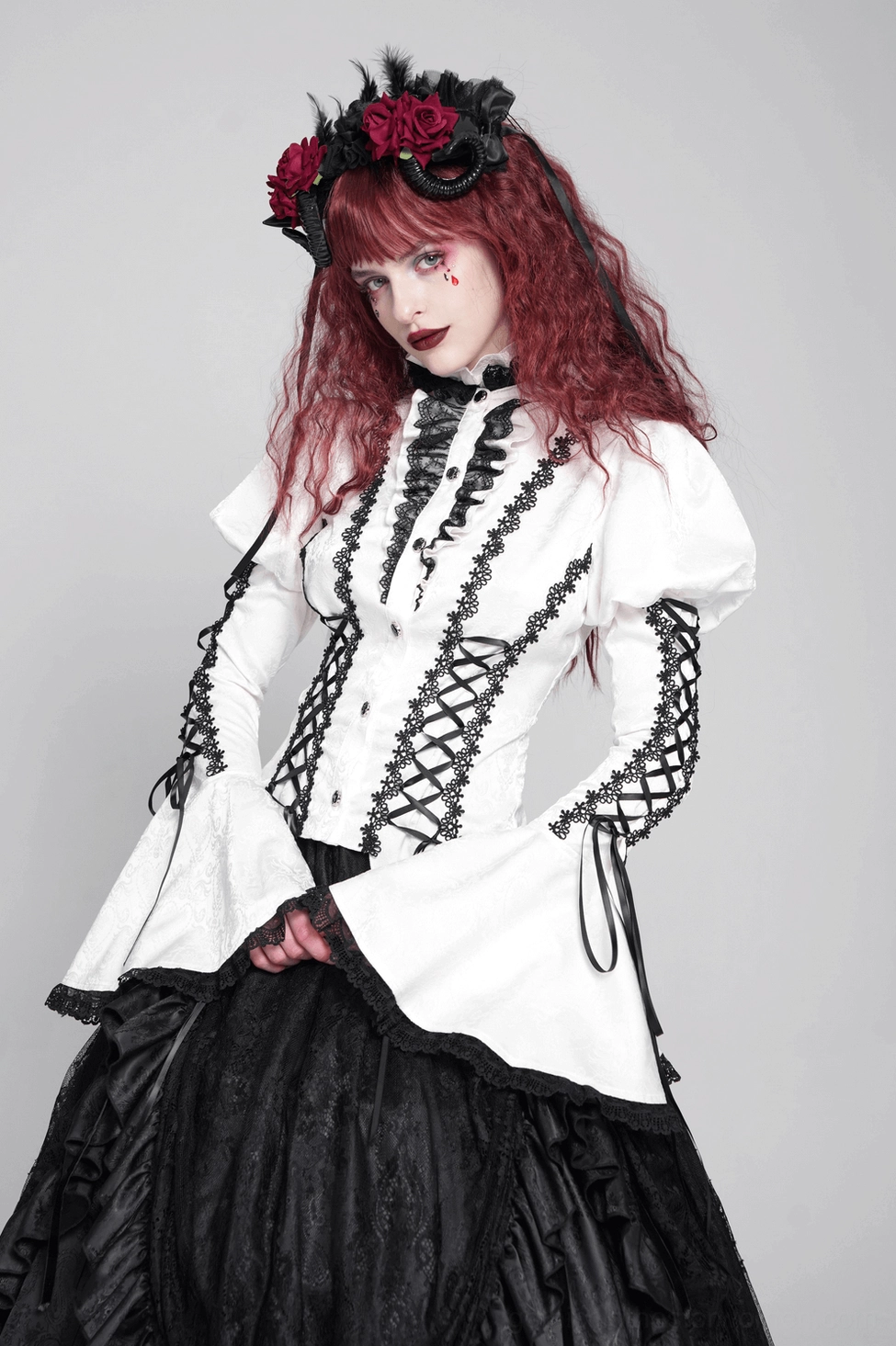 Gothic white lace blouse styled view displaying overall silhouette on form, corset lacing emphasis, and black lace accent placement