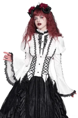 White gothic Victorian lace corset blouse front three-quarter view on model with red curly hair, showing black lace trim, front corset lacing, and bell sleeves against white studio background