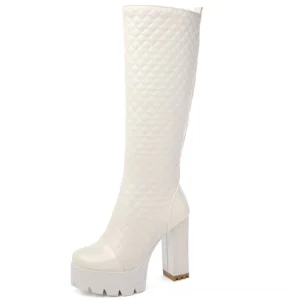 White quilted gothic knee-high platform boots with patent leather details and lug sole, left side profile