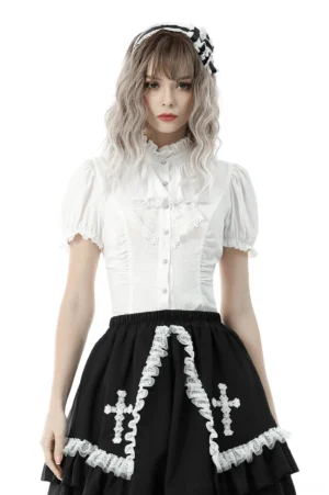 White Victorian gothic lace blouse with puff sleeves and ruffled jabot collar styled with black gothic skirt, front full view