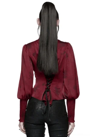 Wine red gothic blouse back view showing corset lace-up detail, smocked cuffs, and billowing lantern sleeves