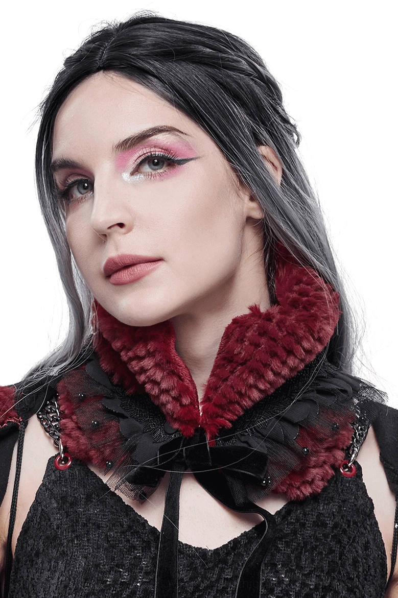 Burgundy faux fur gothic neck collar with black lace bow on female goth model, front view studio portrait