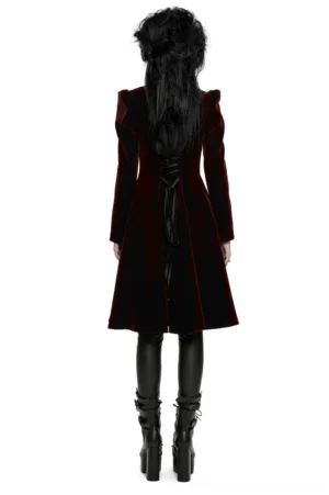 Back view of burgundy velvet gothic coat with black corset lace-up closure and structured silhouette