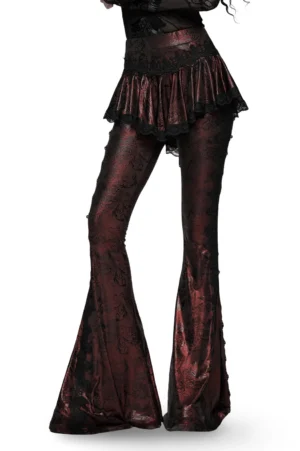 Wine red gothic lace flared pants with asymmetric skirt overlay worn by model, side view showcasing ruffled lace peplum waist and bell-bottom silhouette