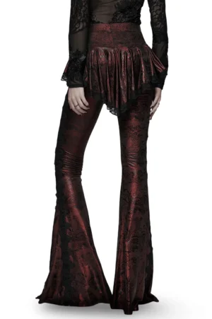 Front view of wine red gothic flared pants with asymmetric black lace ruffled skirt overlay, full-body model shot