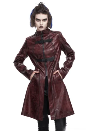 Wine red gothic punk faux leather coat with dual black buckles worn by model with split dyed hair, front full-body view