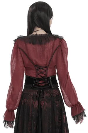 Gothic wine red ruffle blouse back view displaying corset-style lace-up closure with metal eyelets and sheer burgundy fabric, paired with black goth skirt