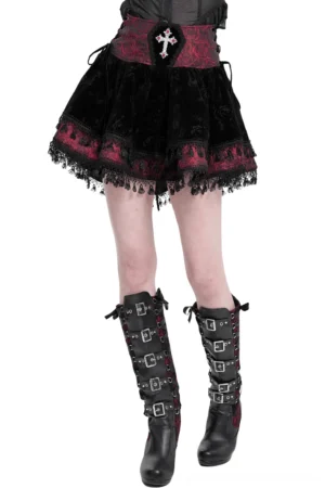 Wine red velvet gothic lace-up skirt with embroidered cross accent front full-body view on model