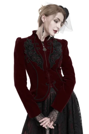 Wine red velvet gothic jacket front view showing ornamental zipper and black lace appliqué on vintage-style model with white background