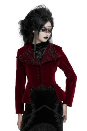 Wine red velvet gothic tailcoat with stand collar embroidery and lace-up corset back, front three-quarter view on model