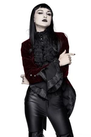 Wine red velvet gothic tailcoat jacket with ruffled lace collar and split tail hem, front three-quarter view on female model