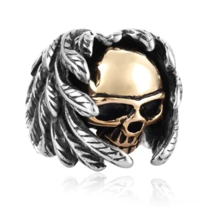 Winged skull gothic ring left front view, silver feather wings with gold skull, steampunk alternative jewelry