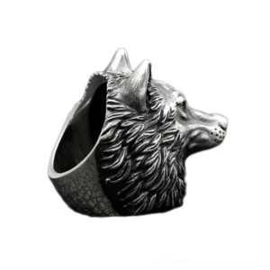 Antique silver wolf ring side profile exposing inner band and mane carving detail