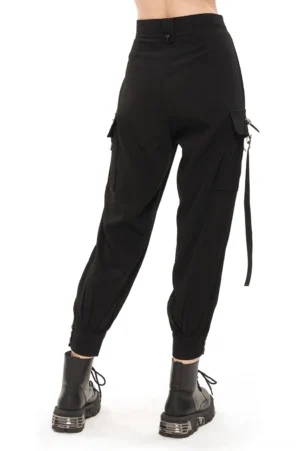 Women's gothic cargo pants side profile view showing fitted silhouette oversized cargo pockets and cropped tapered leg opening with lace-up trim details