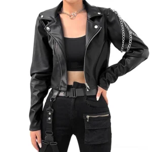 Women's black cropped PU leather moto jacket with silver chain details, front full-body view on model