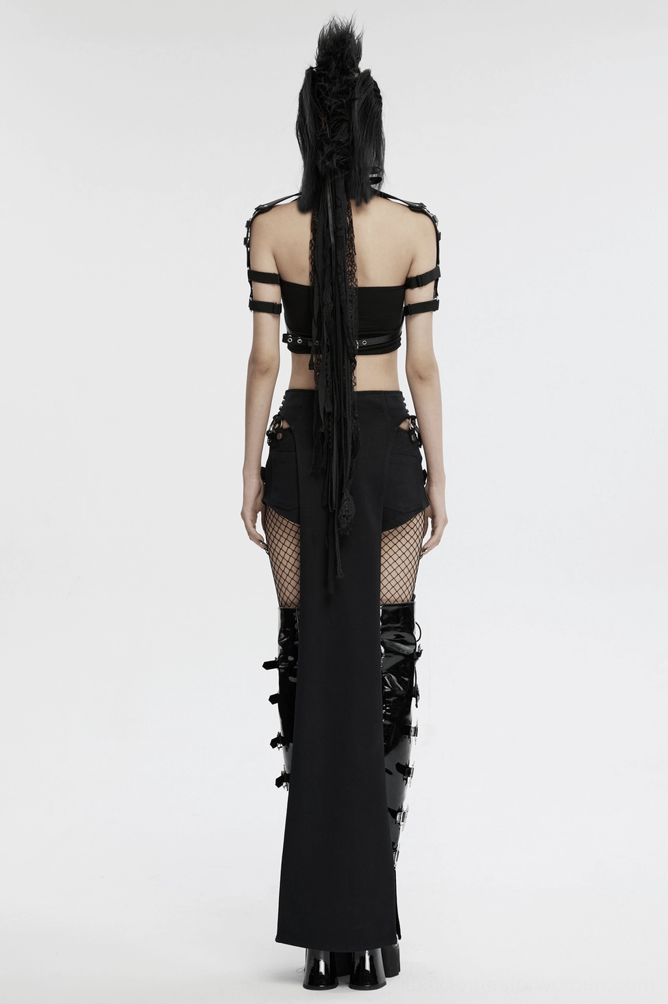 Women's black leather body harness with adjustable buckles and metal O-rings for alternative subculture fashion