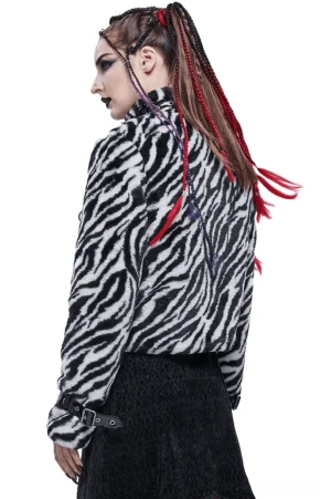 Zebra print faux fur gothic jacket side rear view on model paired with black midi skirt, showing cuff buckle details and full silhouette